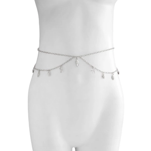 Detail of silver body chain with mermaid, starfish, and seashell charms on a white mannequin