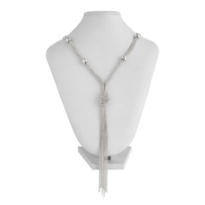 Detail of silver tassel pendant necklace with multi-strand chains and round metallic beads