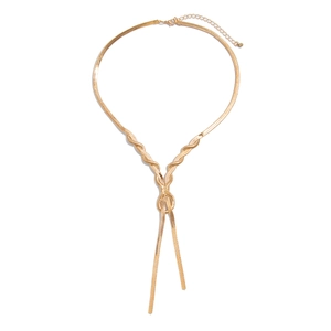 Detailed view of golden snake chain necklace with central knot and long tassels
