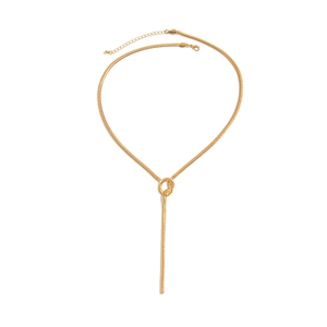 Detail of gold snake chain necklace featuring a unique knotted design and polished finish