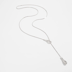 Detailed view of silver snake chain with adjustable teardrop pendant in Y-necklace style