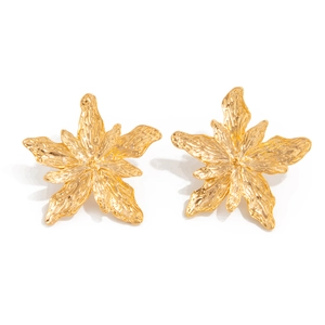 Detailed close-up of golden liquid lava flower earrings with wrinkled metal texture