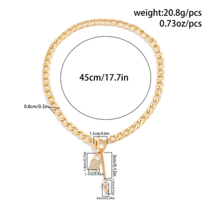 Detail van gouden Cubaanse ketting met hartslot, parel en T-sluiting inclusief afmetingen