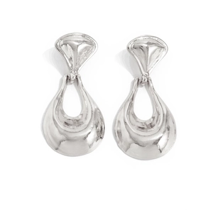 Detailed view of silver liquid lava earrings with textured fan and teardrop metal shapes