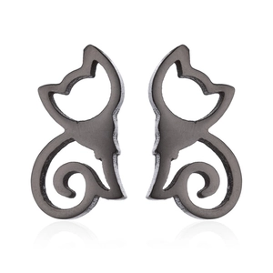 Close-up of minimalist black cat stud earrings with brushed metal texture finish
