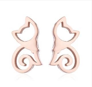 Detailed view of rose gold cat-shaped stud earrings with a minimalist cutout design