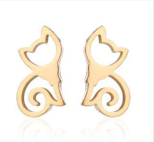 Detail of minimalist gold hollow-out cat silhouette stud earrings for women