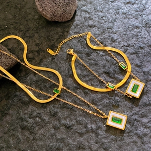 Golden 316L stainless steel jewelry set with double chains and green square gemstones
