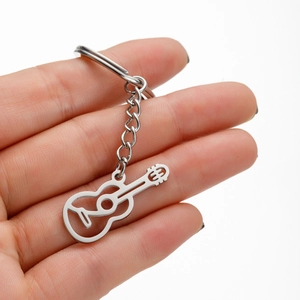 Porte-Clés Mini Guitare Moderne en Acier Inoxydable Pendentif Instrument de Musique Creux pour Amateurs de Musique Cadeau Professeur