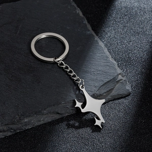 Minimalist silver star pendant keychain with geometric multi-star metal design