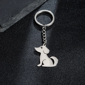 Llavero con colgante de cachorro de acero inoxidable pulido y silueta de perro minimalista