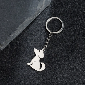 Llavero de silueta de perro en acero inoxidable pulido con anillo de metal redondo