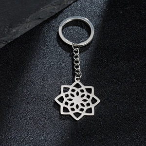 Vintage stainless steel mandala flower pendant keychain with intricate hollow star design