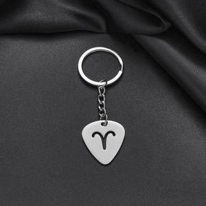 Minimalist stainless steel Aries zodiac keychain with hollow guitar pick design