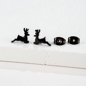 Detail shot of running reindeer stud earrings in matte black stainless steel finish