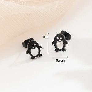 Cute black penguin stud earrings in stainless steel with a heart-shaped cutout design