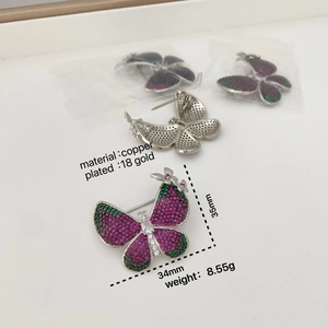 Elegant butterfly brooch featuring pink and green micro-set zircons in 18K gold plated copper