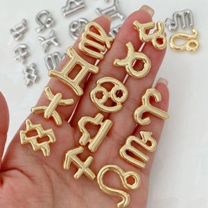 DIY zodiac charm pendants in gold and silver metal finishes for bracelets and necklaces