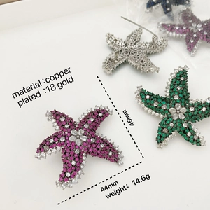 Broche étoile de mer raffinée plaquée or 18 carats avec zircons colorés pour costume