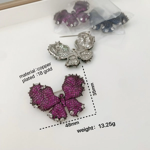 Elegant 18K gold plated copper butterfly brooch with sparkling zircon and purple stones