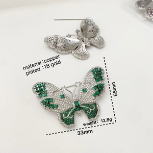 Exquisite 18K gold-plated butterfly brooch with green and white cubic zirconia stones