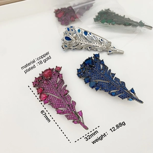 Luxurious 18K gold plated feather brooch set with vibrant colorful zircon crystals