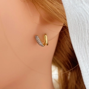 Elegant gold U-shaped hoop earrings featuring micro-pave cubic zirconia accents