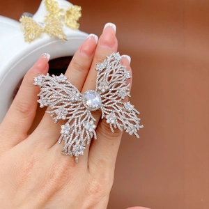 Elegant large butterfly ring in silver metal with cubic zirconia and floral filigree