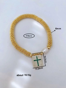Golden beaded bracelet with pearl and cross pendant showing detailed size specifications