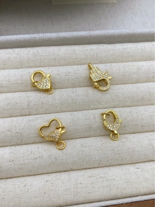 Detail of 18K gold plated lobster clasps with micro-pave cubic zirconia for DIY jewelry