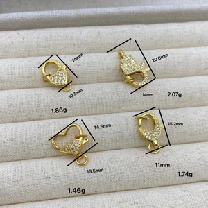 18K gold plated lobster clasps with heart and Hamsa hand designs featuring zircon stones