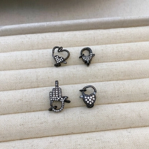 18K gold plated lobster clasps with heart and moon designs encrusted with cubic zirconia
