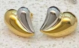 Two-tone heart stud earrings in polished gold and silver plated brass finish
