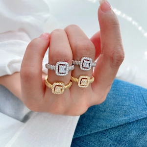 Stackable gold and silver rectangular crystal rings with textured rope bands for women
