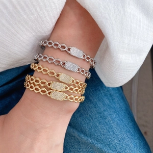 Set of five gold and silver square link bracelets with sparkling pavé cubic zirconia