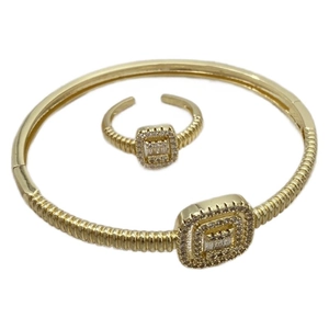 Minimalist gold square cubic zirconia jewelry set with textured ring and open bangle cuff
