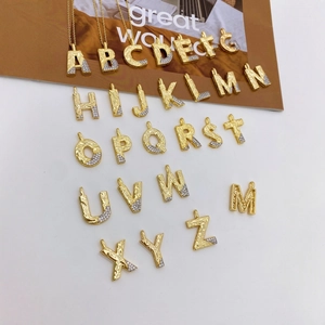 Set of 26 letters A-Z gold pendants with hammered texture and zircon stones on gold chain