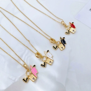 18K gold plated graduation necklace with passport plaque and zirconia heart pendant