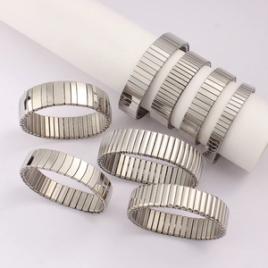 Detailed comparison of various widths and textures of silver stainless steel stretch bracelets