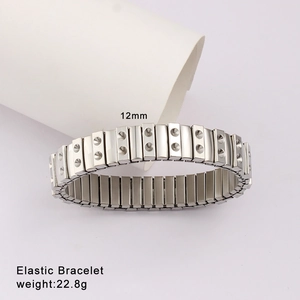 Detail view of 12mm silver stainless steel elastic bracelet with embossed textured segments