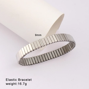 Detail view of 9mm wide elastic stainless steel bracelet weighing 16.7g on white pillar