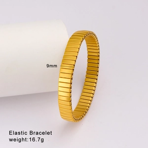 Macro shot of 9mm wide elastic gold bracelet weighing 16.7g with polished metal finish