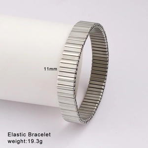 Detailed view of 11mm wide silver elastic stainless steel bracelet with ridged texture