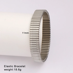 Detail view of an 11mm wide silver elastic bracelet with a textured steel band design