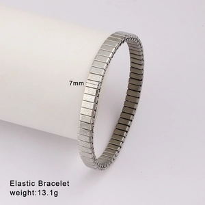 Detail view of 7mm silver elastic bracelet showing width and flexible structure