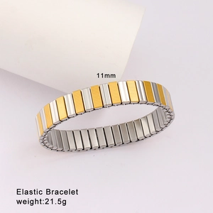 Detail shot of the two-tone elastic bracelet showing brushed metal texture and ridged design