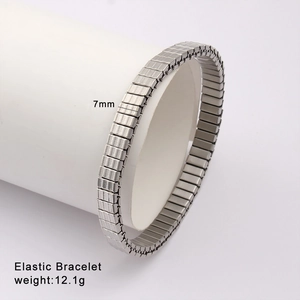 Detail of 7mm silver elastic stainless steel bracelet showing brushed metal texture