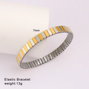 Detail of 7mm elastic bracelet with alternating gold and silver polished metal links