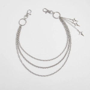 Close-up of triple-layered silver metal pants chain with three hollow star pendants