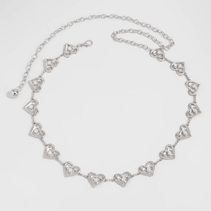 Detail view of silver heart waist chain with white pearls and adjustable lobster clasp